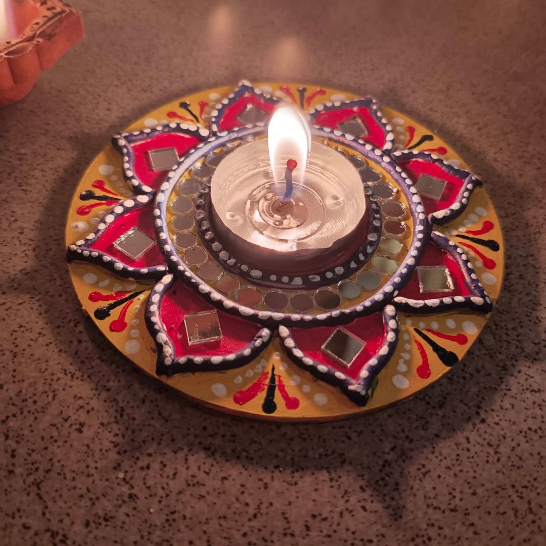 Candle holder with diya